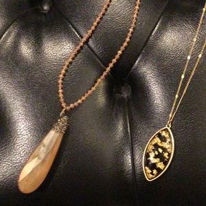 Pair of new with tags long necklaces with statement flare!